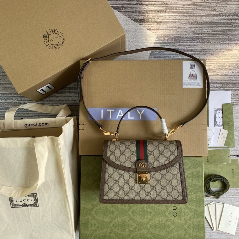 G*u*i top handle bags